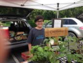 Grant helps us harvest and present the vegetables, herbs and flowers to our market customers.